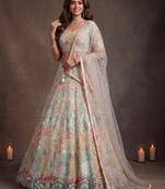 Bewitching White Thread and Multiple Sequins Embroidered Soft Net reception wear lehenga