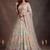 Bewitching White Thread and Multiple Sequins Embroidered Soft Net reception wear lehenga