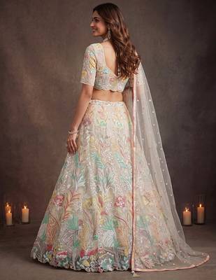 Bewitching White Thread and Multiple Sequins Embroidered Soft Net reception wear lehenga 3