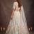 Bewitching White Thread and Multiple Sequins Embroidered Soft Net reception wear lehenga