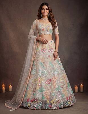Bewitching White Thread and Multiple Sequins Embroidered Soft Net reception wear lehenga 4