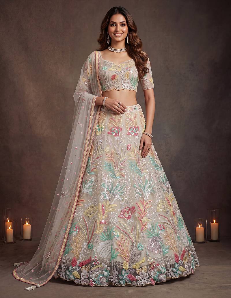 Bewitching White Thread and Multiple Sequins Embroidered Soft Net reception wear lehenga