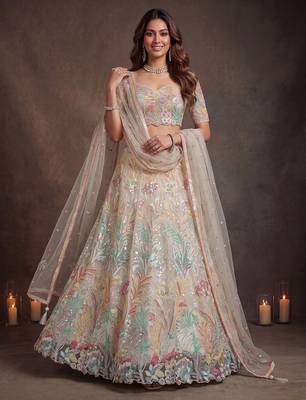 Bewitching White Thread and Multiple Sequins Embroidered Soft Net reception wear lehenga 5