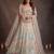 Bewitching White Thread and Multiple Sequins Embroidered Soft Net reception wear lehenga