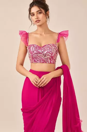 Hot pink crepe and net ruffle saree set