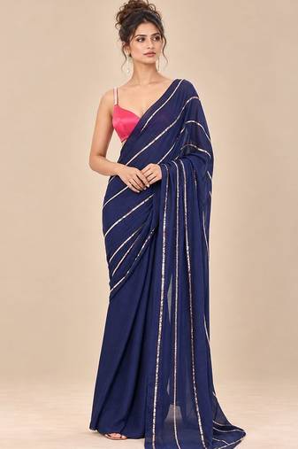 Navy blue embroidered saree with hot pink blouse