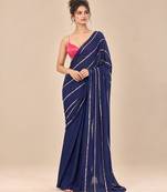 Navy blue embroidered saree with hot pink blouse