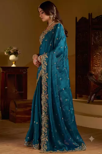 Rama colour satin silk saree with heavy embroidery work blouse