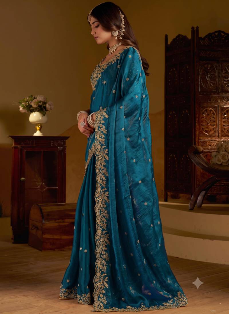 Rama colour satin silk saree with heavy embroidery work blouse