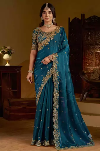 Rama colour satin silk saree with heavy embroidery work blouse