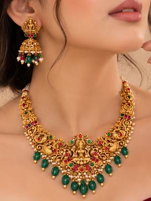 gold-plated temple necklace set with goddess lakshmi design and jhumka earrings 1
