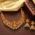 gold-plated temple necklace set with goddess lakshmi design and jhumka earrings