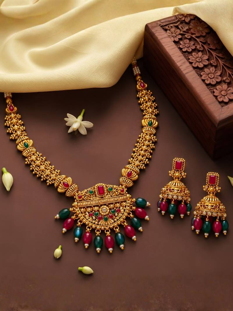 gold-plated stone necklace set with statement pendant and jhumka earrings
