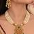 gold-plated copper pearl layered necklace set with green stone pendant
