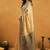 beige cotton blend saree with zari jhallar & rich pallu