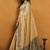 beige cotton blend saree with zari jhallar & rich pallu
