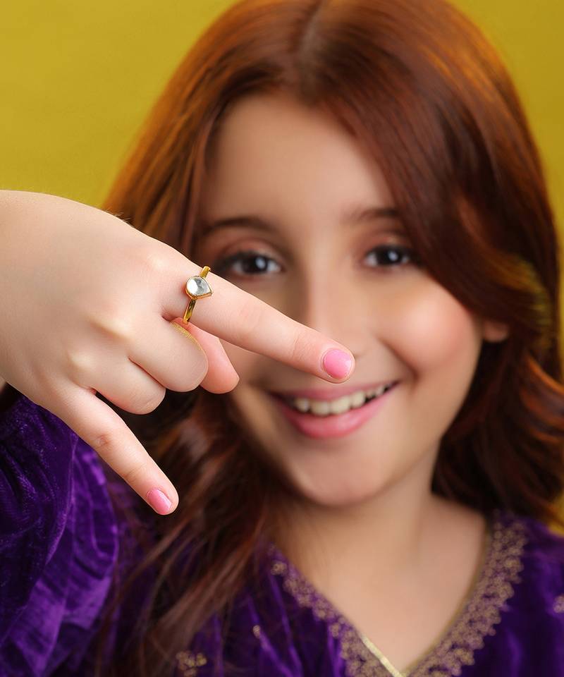 Gold plated kundan blue ring
