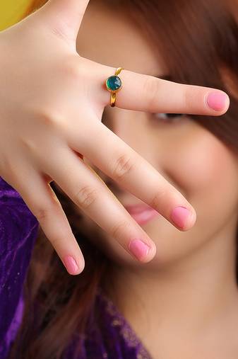 Gold plated kundan green ring
