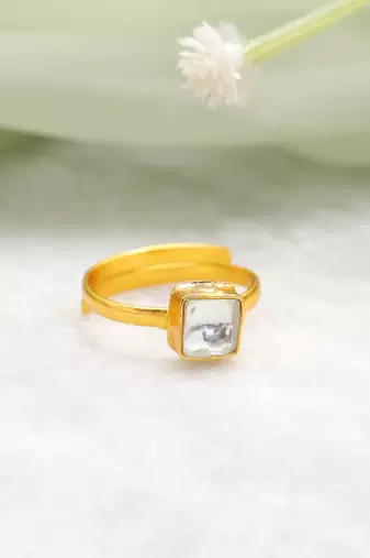 Gold plated kundan blue ring