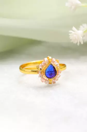 Gold plated kundan blue ring