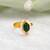 Gold plated kundan green halo ring