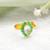 Gold plated kundan green halo ring