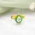 Gold plated kundan green halo ring