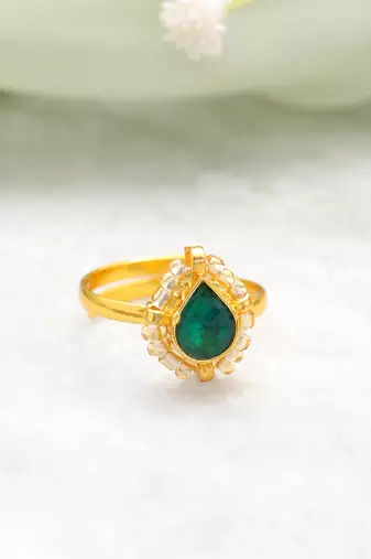 Gold plated kundan green halo ring