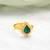 Gold plated kundan green halo ring