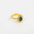 Gold plated kundan green halo ring