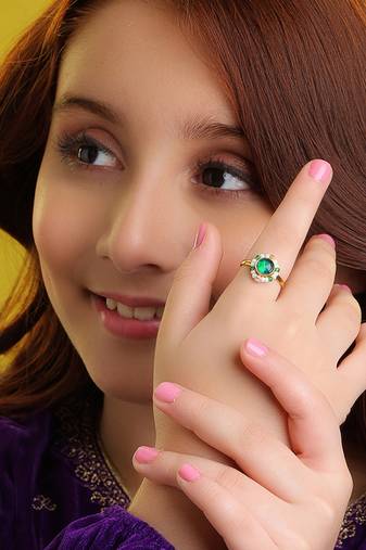Gold plated kundan green halo ring