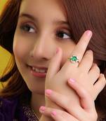 Gold plated kundan green halo ring