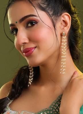 Gold plated kundan white pearl tassel earrings 1