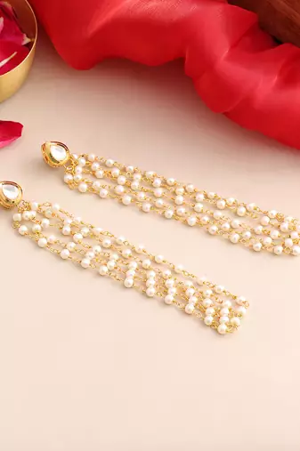 Gold plated kundan white pearl tassel earrings