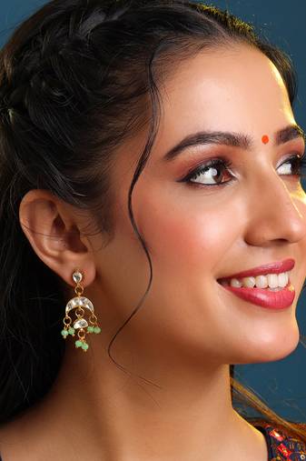 Gold plated kundan green jhumka earrings