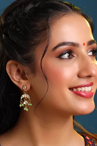 Gold plated kundan green jhumka earrings