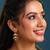 Gold plated kundan green jhumka earrings