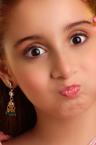 Gold plated kundan green drop earrings