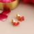 Gold plated kundan red stud earrings