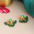 Gold plated kundan emerald green earrings
