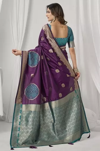 wine soft silk blend with fancy pom pom detailing festive wear saree