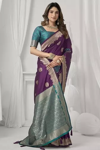 wine soft silk blend with fancy pom pom detailing festive wear saree