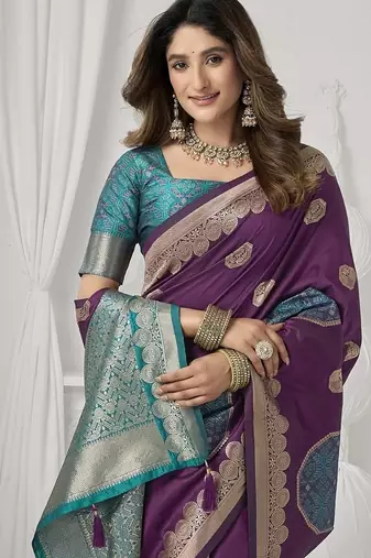 wine soft silk blend with fancy pom pom detailing festive wear saree