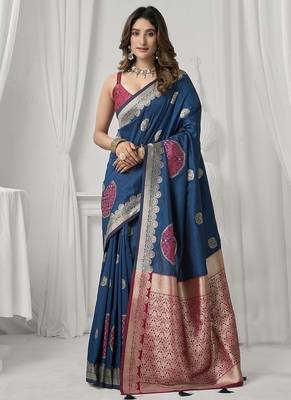 teal blue soft silk blend with fancy pom pom detailing festive wear saree 1