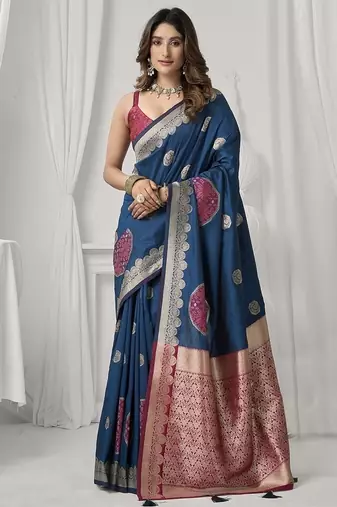 teal blue soft silk blend with fancy pom pom detailing festive wear saree