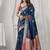 teal blue soft silk blend with fancy pom pom detailing festive wear saree