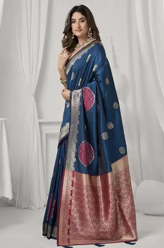 teal blue soft silk blend with fancy pom pom detailing festive wear saree