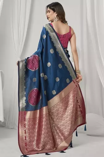teal blue soft silk blend with fancy pom pom detailing festive wear saree