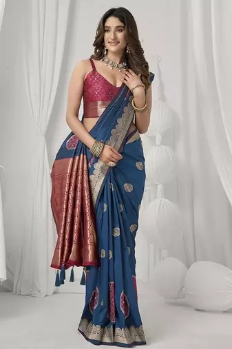 teal blue soft silk blend with fancy pom pom detailing festive wear saree