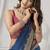 teal blue soft silk blend with fancy pom pom detailing festive wear saree